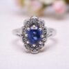 Bague marguerite vintage avec saphir ovale et entourage diamants, Nantes